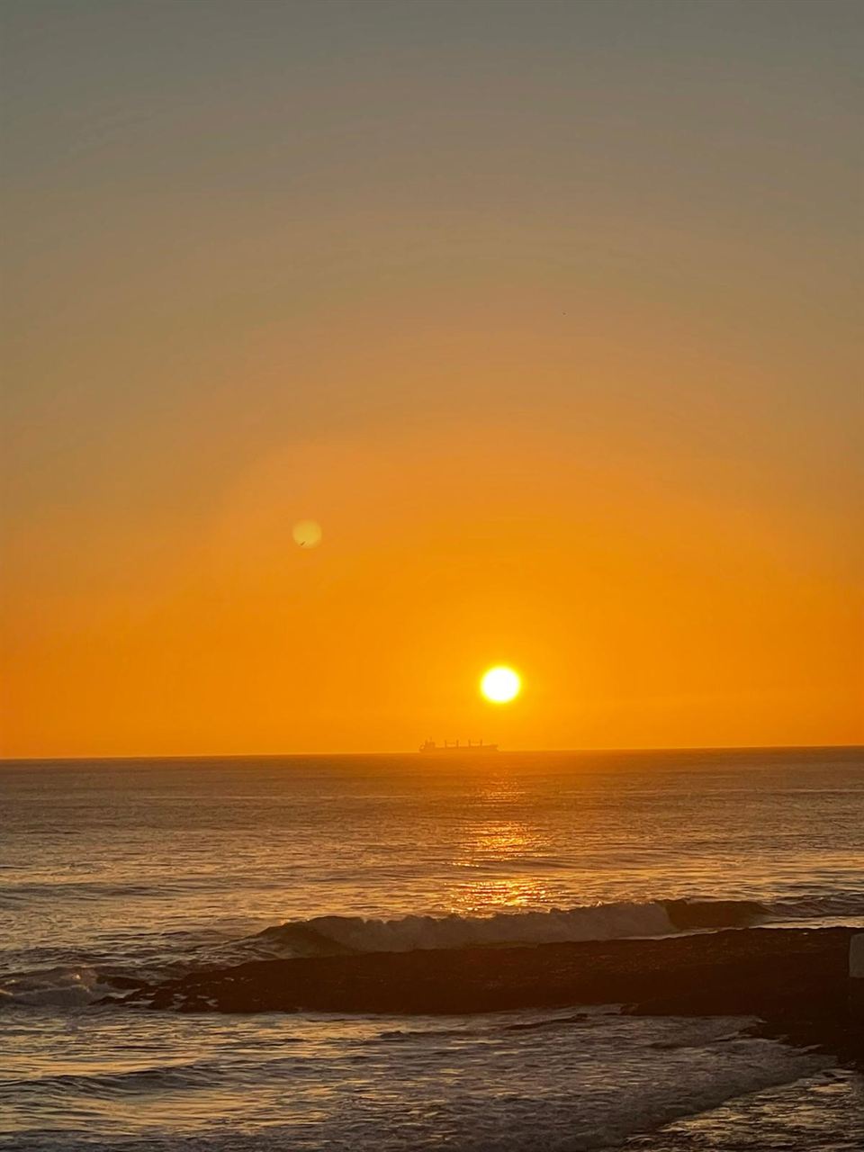 Golden sunset over the Atlantic Ocean from the Sintra-Cascais coast